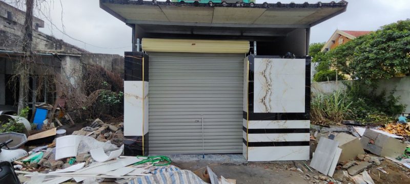 sửa cửa cuốn tấm liền